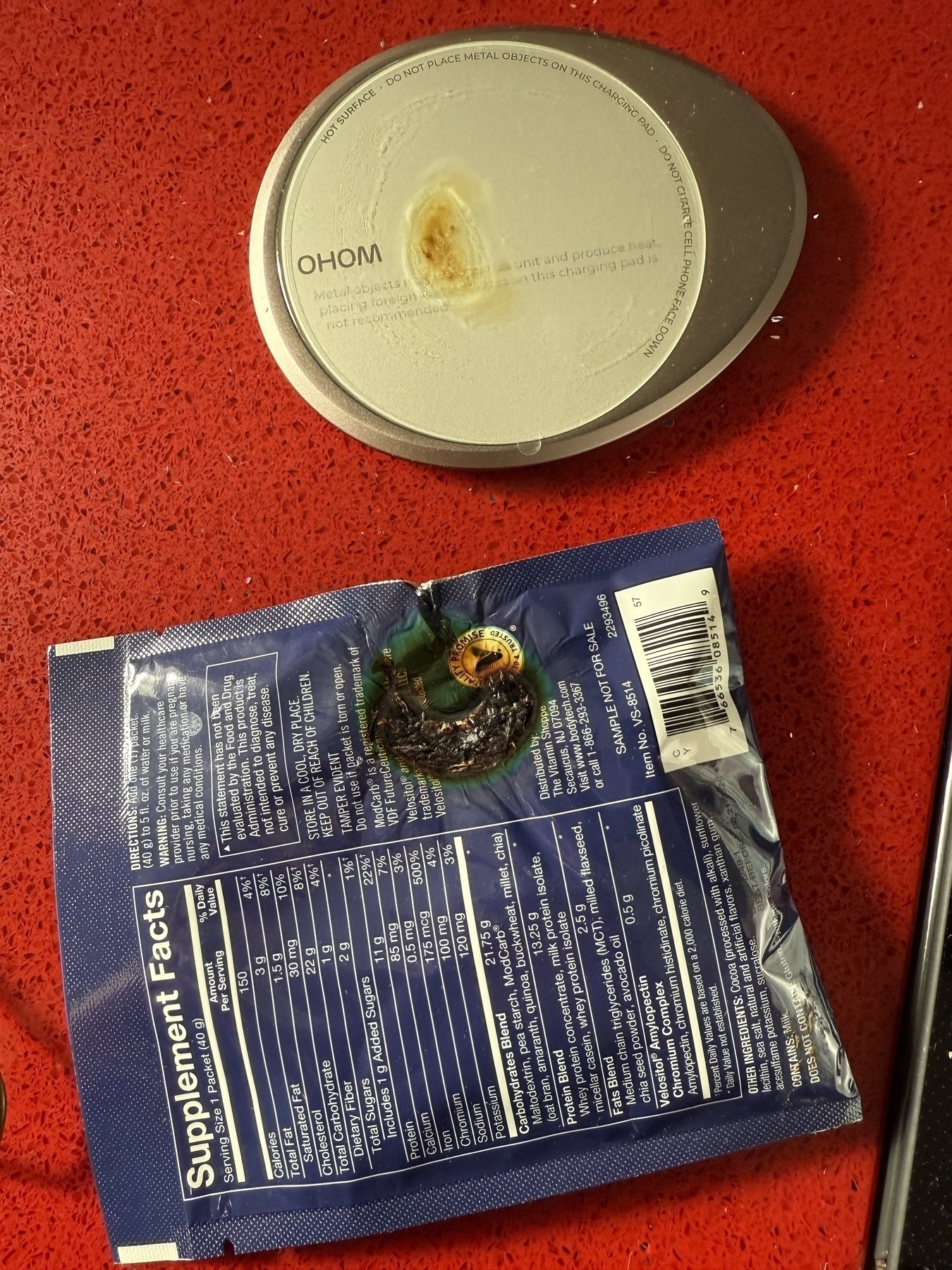 Protein packet and warming base, both with patches of melted plastic 